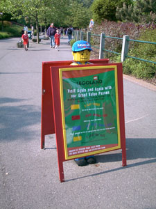 Legoland - Lego figure & sandwich board